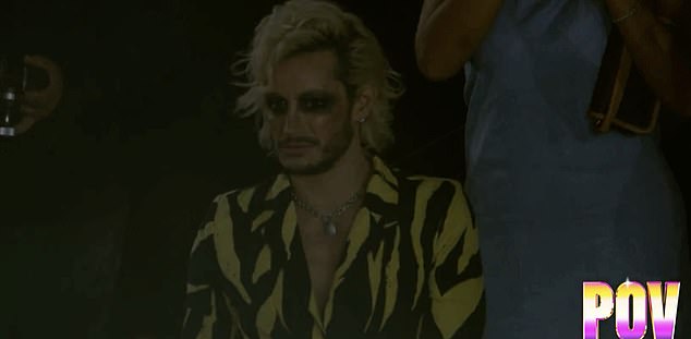 The 42-year-old — who was there in support of Ariana along with their mother Joan — was caught making a sour expression as McRae performed her racy routine