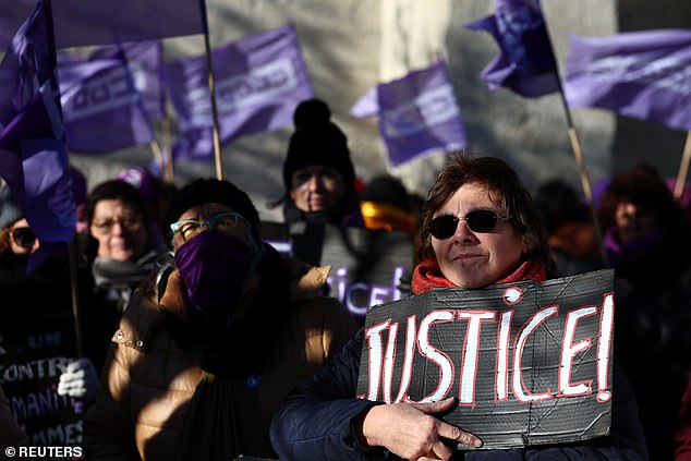 People gather in support of Frenchwoman Gisèle Pelicot, the victim of a mass rape orchestrated by her then-husband Dominique Pelicot at their home in the southern French town of Mazan, in December 2024