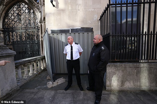 The latest apparent Banksy mural at London's High Court was quickly covered by a screen