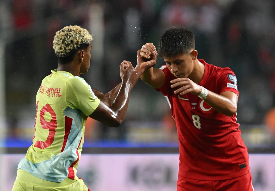 Lamine Yamal and Arda Guler during a soccer match.