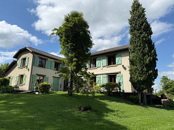 For sale: This five-bed house owned by the Munsons in Tournay is priced at £253,700.