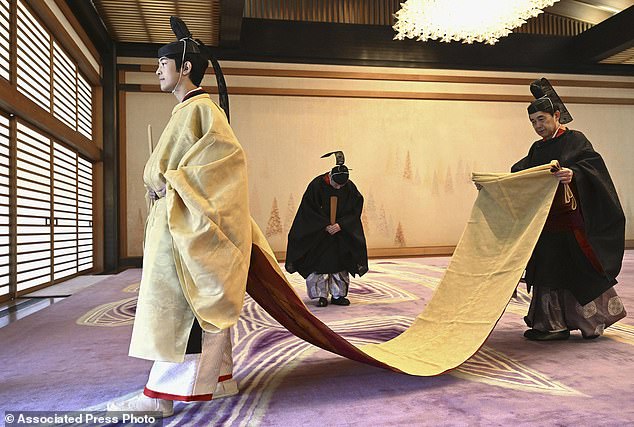 Hisahito is seen in ceremonial attire during his coming-of-age rites in the Imperial Palace