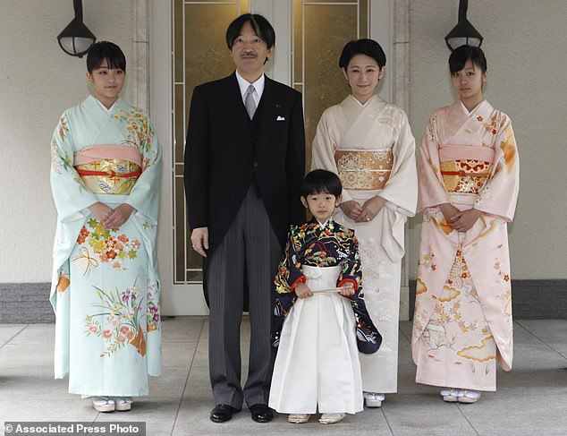 A five-year-old Hisahito, wearing a traditional ceremonial attire, is accompanied by his parents, Prince Akishino, Princess Kiko, his sisters Princess Mako, left, and Princess Kako, right, after attending 'Chakko-no-gi' ceremony to celebrate his growth and the passage from infancy to childhood, at the Akasaka imperial estate in Tokyo in November 2011