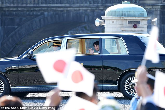 He waved at the gathered crowds as he left the Imperial Palace in Tokyo
