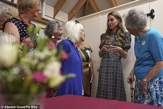 Kate, who sported a frock from Alessandra Rich, donned tartan print to the event this morning, as she joined her husband