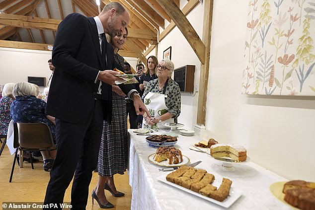 Both William and Kate looked to be enjoying the spread of cakes available at the engagement today