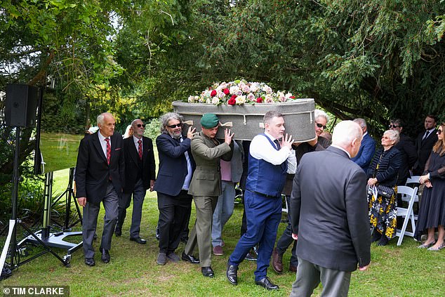 The legendary broadcaster's career spanned six decades and Farage - dressed in a dark suit and black tie - was accompanied into the service by Lizzie Cundy