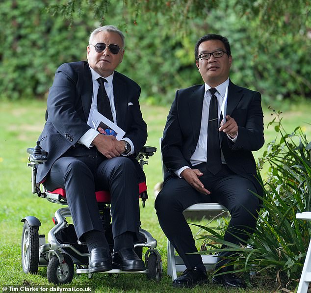 Eamonn (L) attended in a motorised wheelchair following his numerous back surgeries