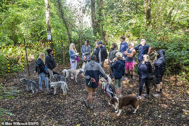 Local walkers accuse the family of using 'increasingly aggressive tactics' including putting up barbed wire and black and yellow tape preventing access