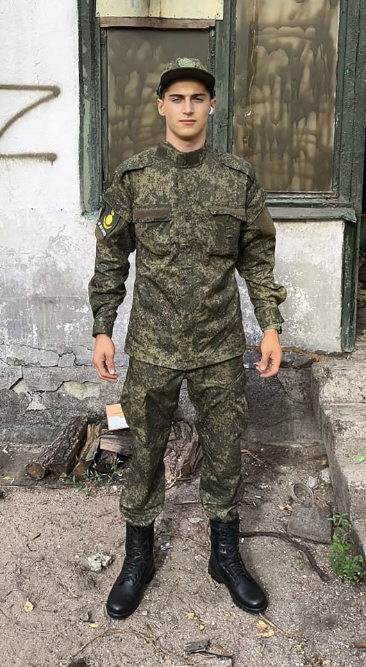Photo of Maksim Suvorov, an 18-year-old teen sniper, in military uniform.