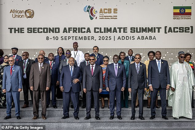 Djibouti's President Ismail Omar Guelleh (3rd L), Ethiopia's Prime Minister Abiy Ahmed (4th L), Kenya's President William Ruto (4th R) and African Union Commission Chairperson Mahmoud Ali Youssouf (3rd R) pose for a group photo with other African heads of state and government representatives