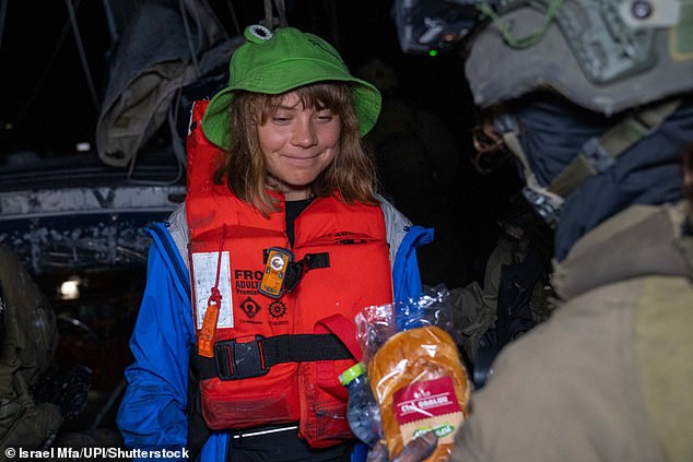 Greta Thunberg pictured in the early morning of Monday, June 9, 2025, after the Israeli Defense Forces boarded the "Madleen," a small civilian maritime vessel previously bound for Gaza with humanitarian aid, and rerouted those on board toward Israel