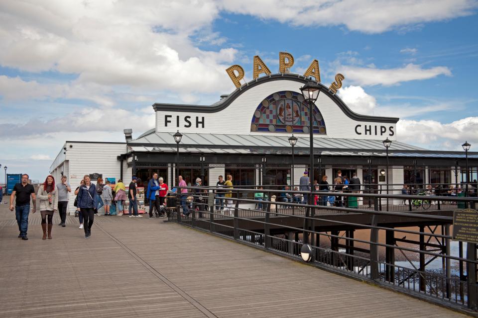 Papa's Fish and Chips shop on a pier.