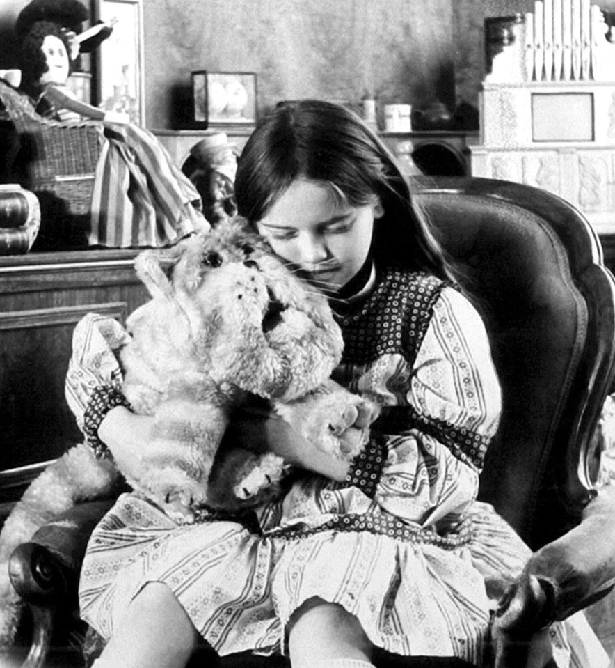 Emily Firmin recreating her role in the children's TV show *Bagpuss*.