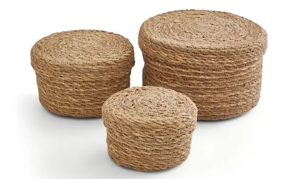 Three woven baskets of varying sizes.