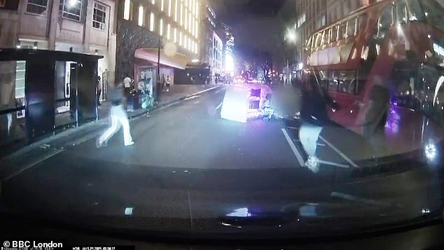 The vehicle was overturned in the crash, with members of the public rushing in to help