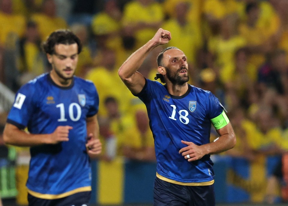 Vedat Muriqi of Kosovo celebrates scoring a goal.