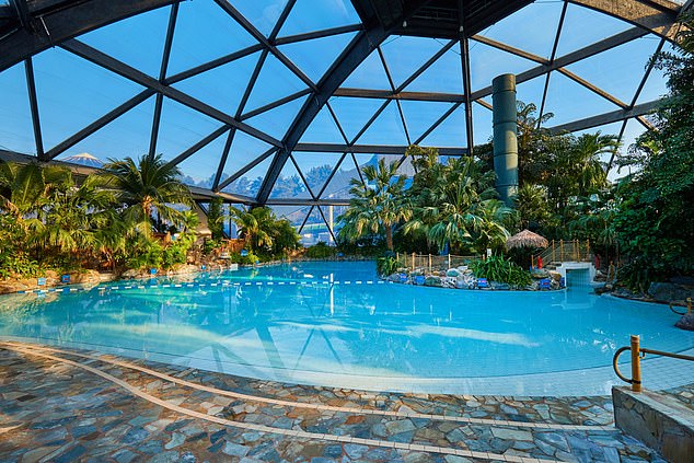 Some two million visitors spend their holidays at the UK's five Center Parc villages in the UK every year - and while staff get perks including day passes and discounts, some say working for the company is 'stressful' (Pictured: The brand's signature Subtropical Swimming Paradise)