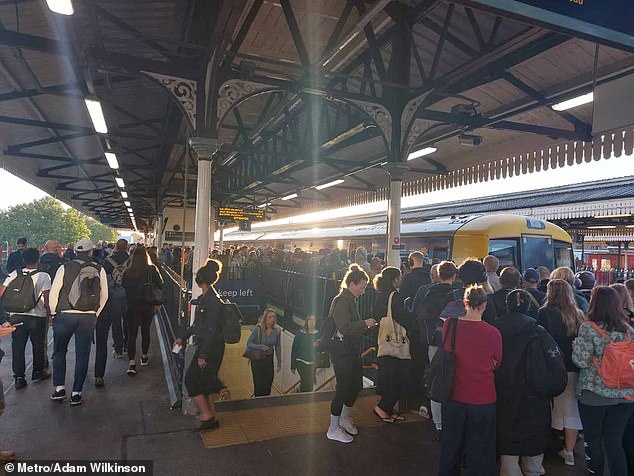 Hundreds of workers lined the platforms at Clapham Junction this morning as they looked to get on the arriving train