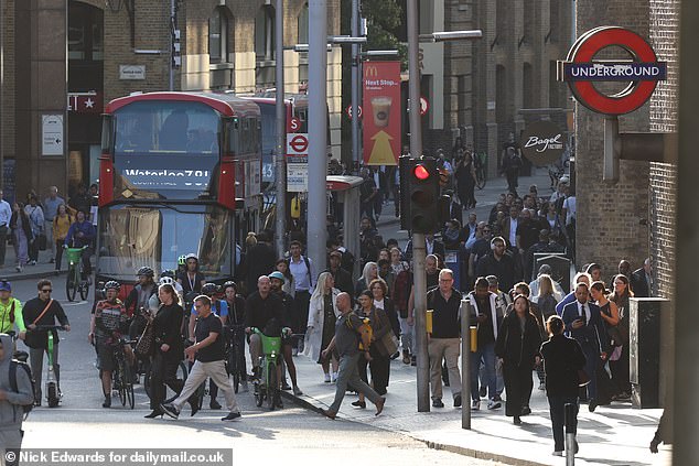 A bus heading to Waterloo was surrounded by commuters on Lime Bikes, e-scooters and walkers