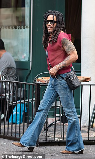 Lenny was looking every inch the rock god as he prepared to meet his beloved daughter's new squeeze