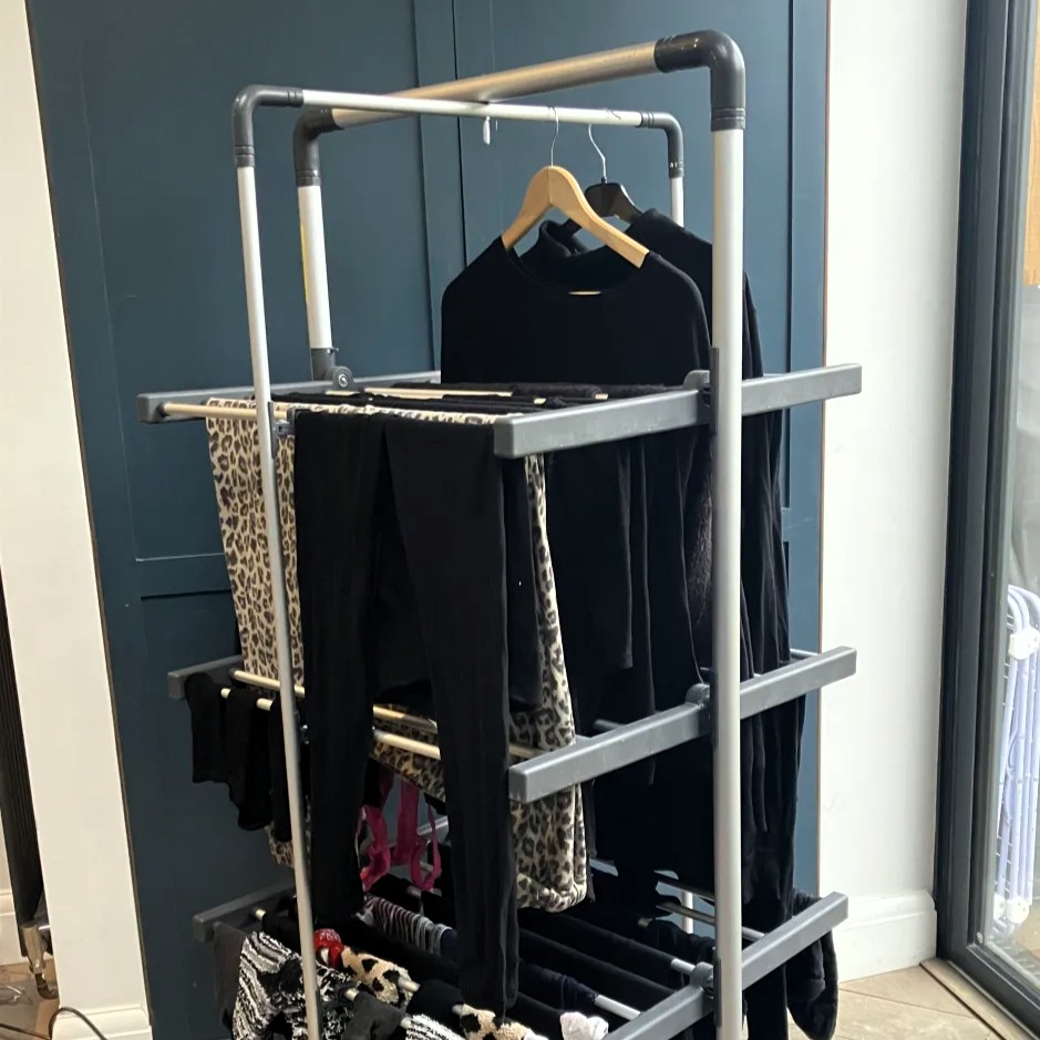 Black + Decker 3-tiered heated airer with clothes drying.