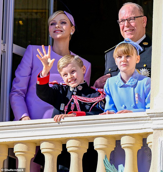 Charlene and her twins Princess Gabriella and Prince Jacques decided against travelling to Japan amid 'current events' in the Middle East (seen together with Albert during army parade in November, 2024)