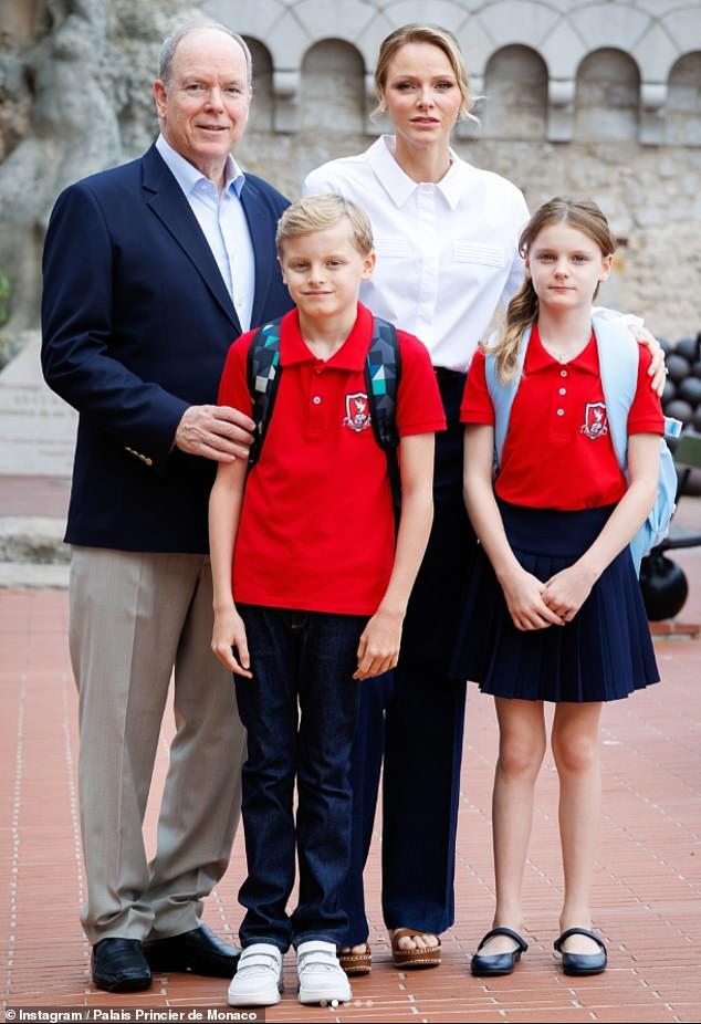 The ten-year-old pupils beamed in social media snaps as they kicked off the academic year, accessorising their uniforms with a personal twist. Pictured with their parents