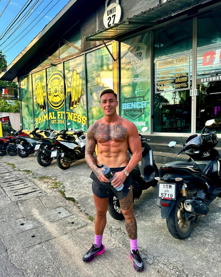 Man standing outside Primal Fitness gym.