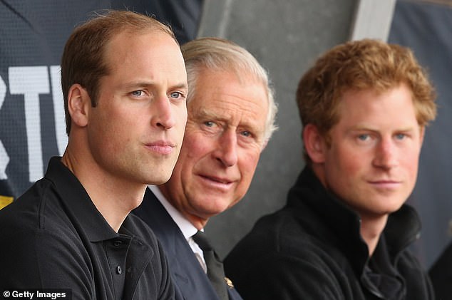 Princes William and Harry with the then-Prince of Wales at the Invictus Games in 2014