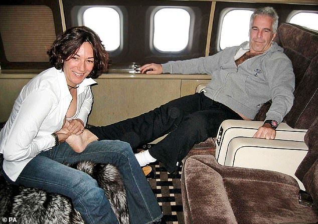 An undated photo issued by the US Department of Justice of British socialite Ghislaine Maxwell with American financier Jeffrey Epstein