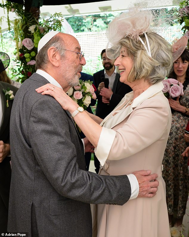 The Coronation Street star, 79, looked radiant in blush pink as she exchanged vows with her business consultant partner, also 79, to whom she proposed last September