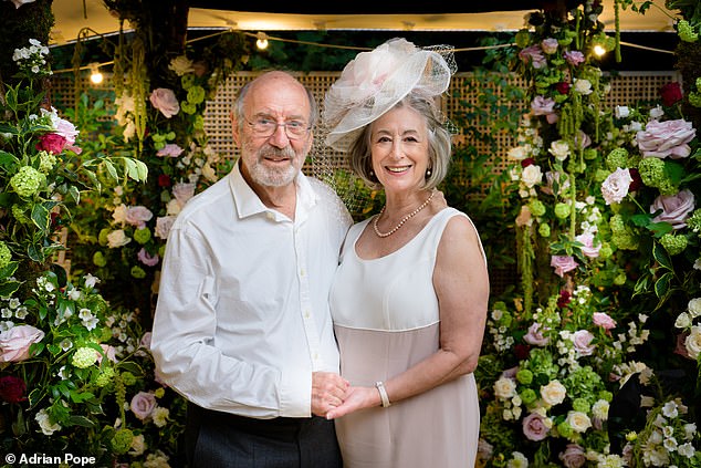 The septuagenarian looked stunning in her pink coat dress, paired with a dramatic cream fascinator and elegant pointed mid-heel shoes