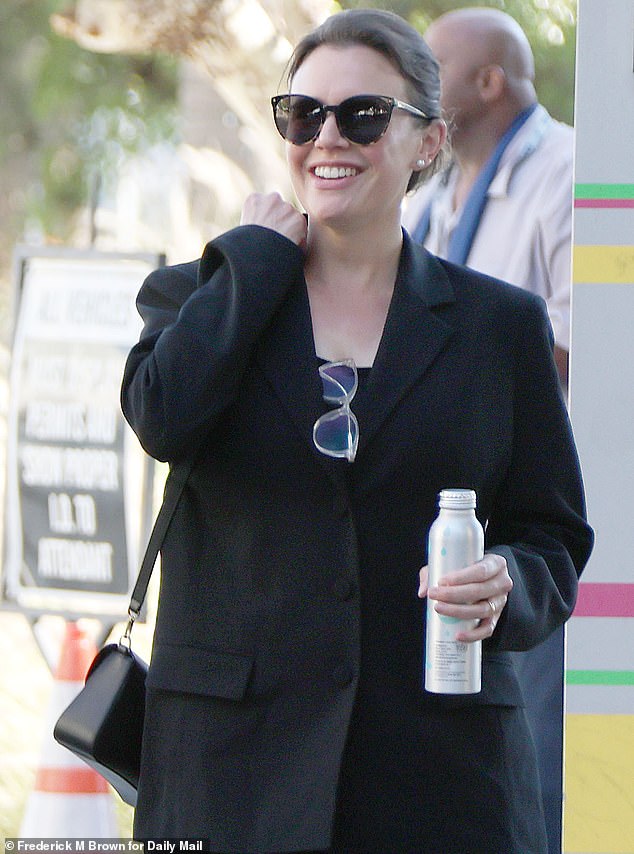 The 40-year-old heiress donned an elegant black pant suit, matching pumps, simple pearl earrings and had her hair pulled back in a clip for court