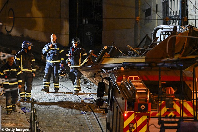 After the catastrophic tram wreck, Iguernane said she was in and out of consciousness for multiple days, unaware of where her husband was or if he was alive (pictured: emergency responders at the scene)