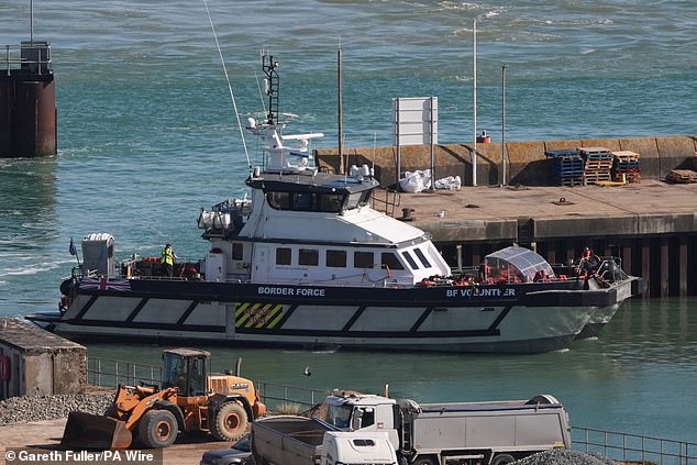 A Border Force boat, carrying suspected migrants thought to have been picked up during the rescue operation, arrived in the Port of Dover just after 3pm