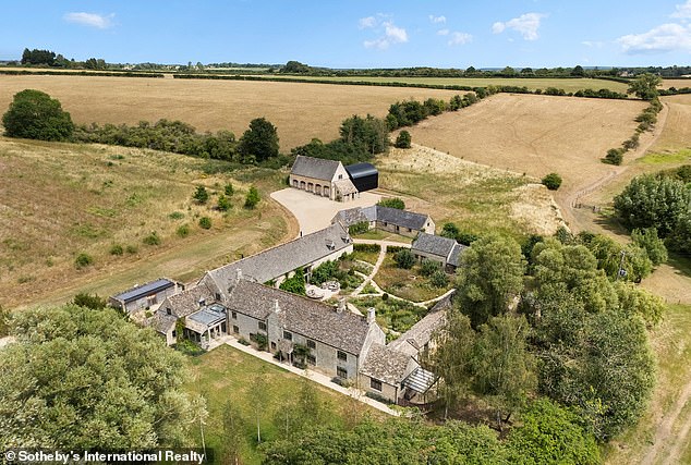 High end estate agent Sotheby's International Realty is marketing the seven-bedroomed home as 'a landmark country estate in the heart of the Cotswolds'