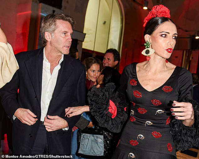 In January, local media snapped the prince and the 54-year-old businesswoman (pictured at the event), who runs her own luxury shoe brand, Maison Skorpios, kissing after a fashion event that they attended together in Seville