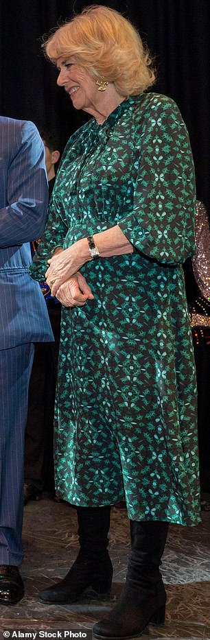Queen Camilla wearing the green dress in 2022
