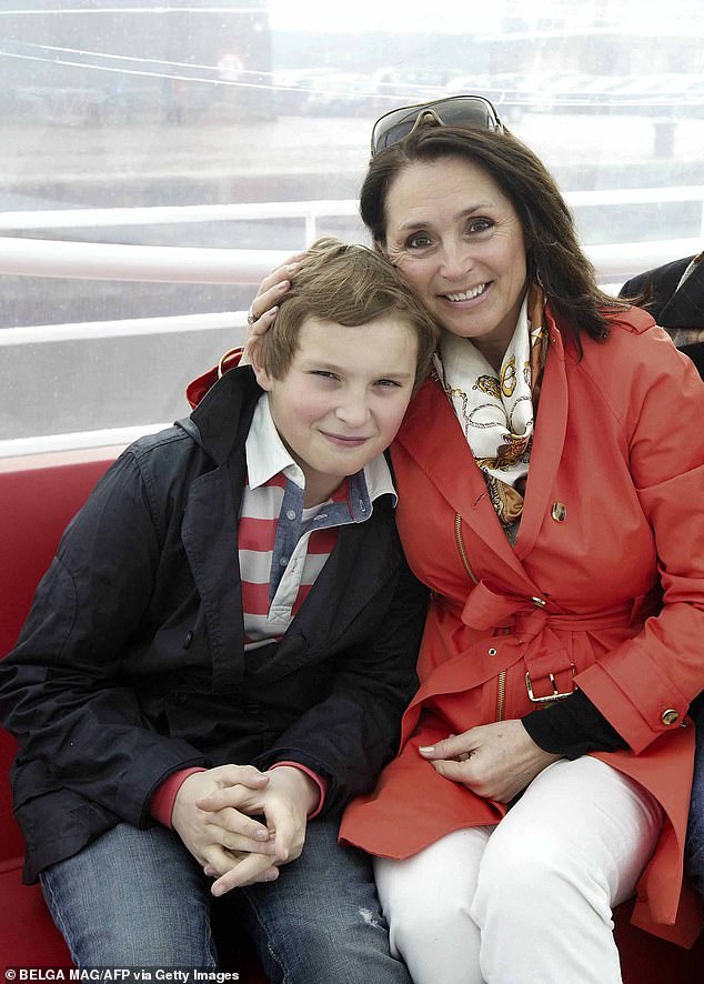 As well as being a singer, she had also starred in a number of movies and TV shows, and now shares photos with her husband - Frans Van Coppenolle - and their children. Pictured with Clement in 2013