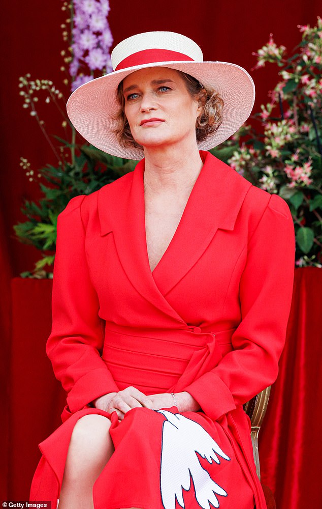 Princess Delphine of Belgium attends the military parade in the front of the Royal Palace at National Day in July 2022
