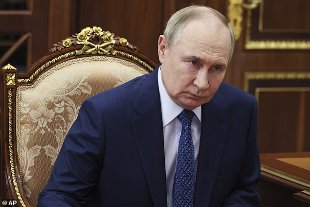 Following talks with with defence officials from Poland, Italy, France and Germany, the Defence Secretary told a press conference: 'We see what Putin is doing. Yet again he is testing us. Yet again we will stand firm'