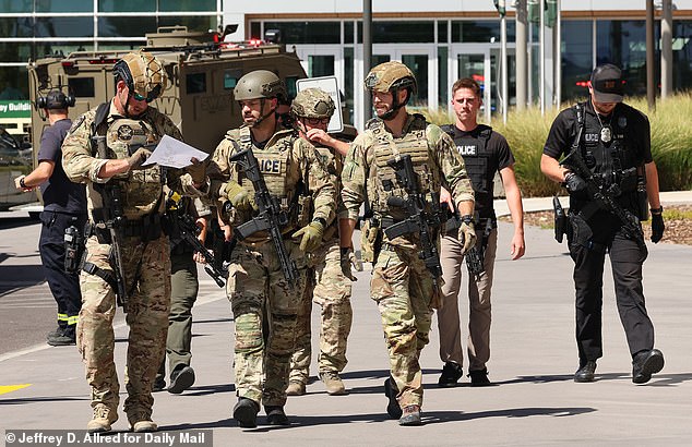 Law enforcement work the active shooting scene at Utah Valley University in Orem, Utah, USA on Wednesday, Sept. 10, 2025. Charlie Kirk was shot while speaking at UVU.