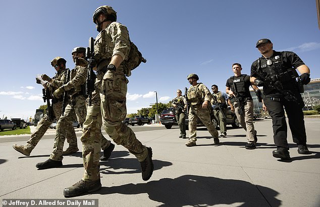 Law enforcement work the active shooting scene at Utah Valley University in Orem, Utah, USA on Wednesday, Sept. 10, 2025. Charlie Kirk was shot while speaking at UVU.