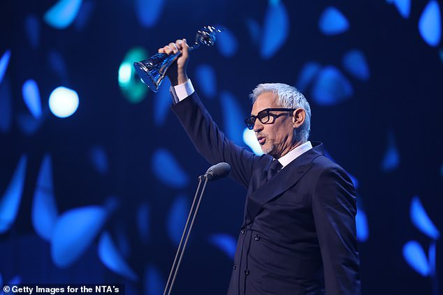 The emotional presenter used his acceptance speech to take a pointed dig at his controversial departure from Match of the Day, as he declared it was 'OK to speak up on behalf of those who have no voice'