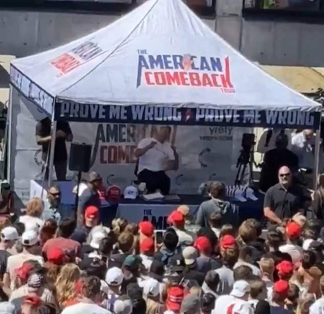 The conservative commentator was struck in the neck by a single bullet while addressing the crowd about mass shootings (pictured)