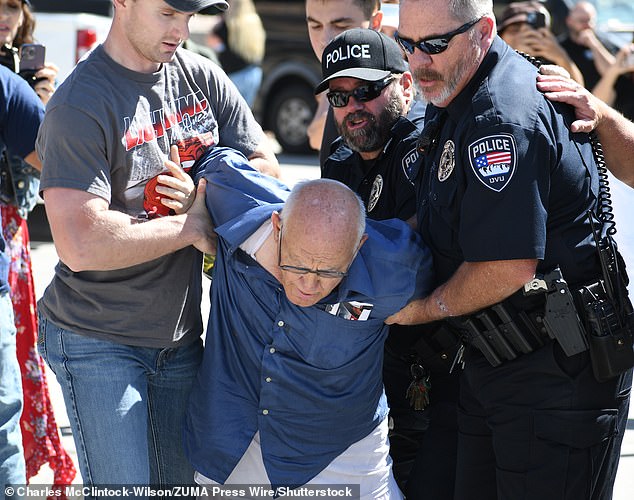 An elderly man identified as George Zinn (pictured) was initially taken into custody by police following the shooting but was later released after being confirmed not to be the gunman