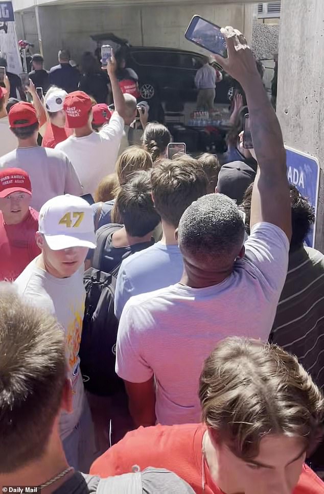 Zachary Morris, who attended the event with his 3-year-old daughter, described a wave of confusion followed by 'mass panic' in the crowd the moment the shot was fired (pictured: aftermath)