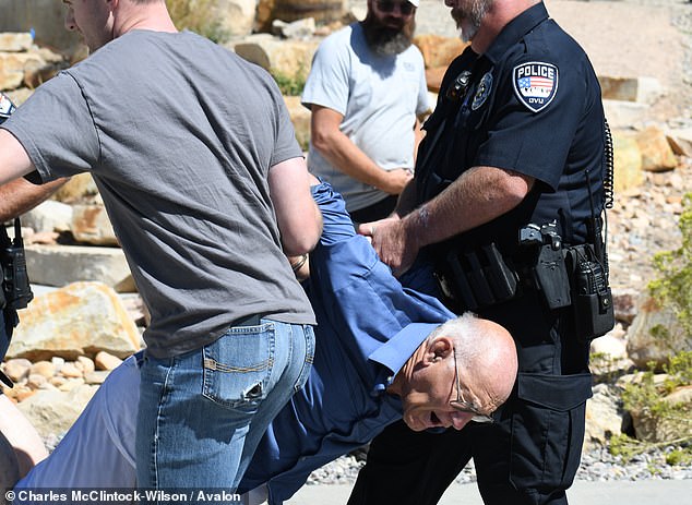 Reports suggested that Zinn (pictured) - the first arrest made - had made remarks about the shooting as he was being detained, while separate footage showed him repeatedly urging the crowd to 'shoot him'