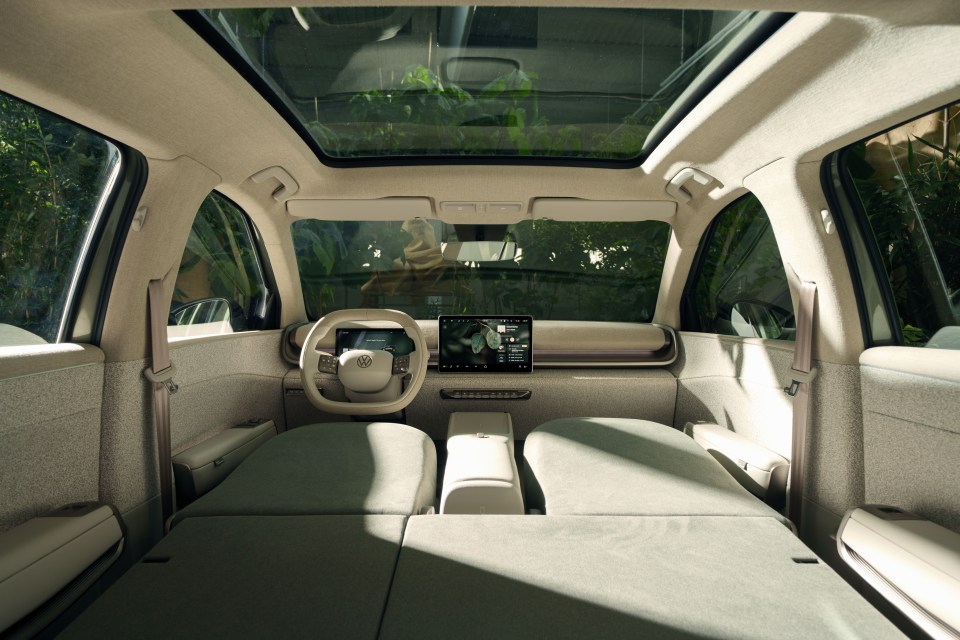 Interior view of a car with seats folded down.